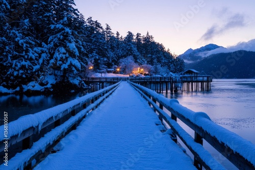 Wallpaper Mural Snow-covered boardwalk extends to a tranquil bay, trees behind under a pastel sky at dusk Torontodigital.ca
