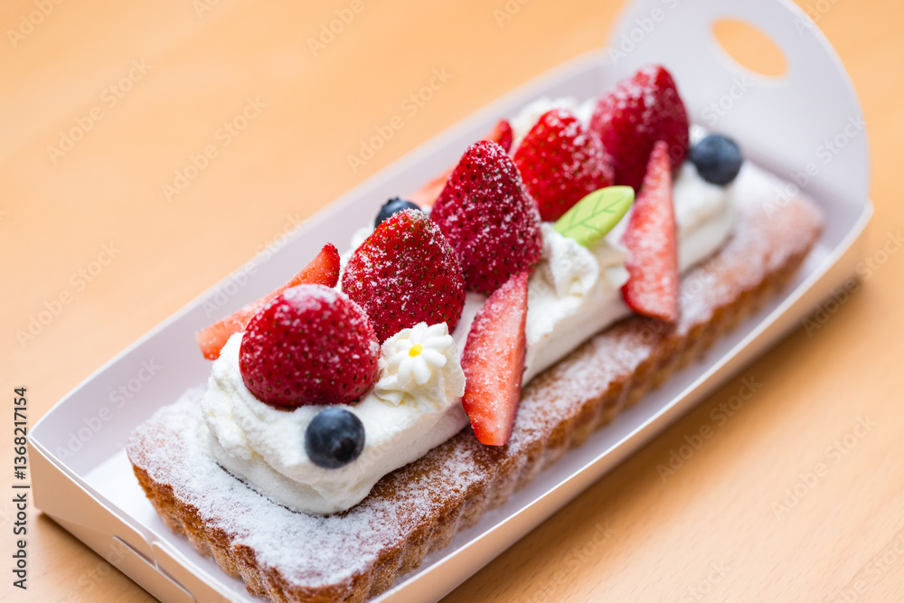 Beautiful strawberry cake with soft sponge layer.