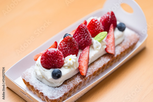 Beautiful strawberry cake with soft sponge layer.