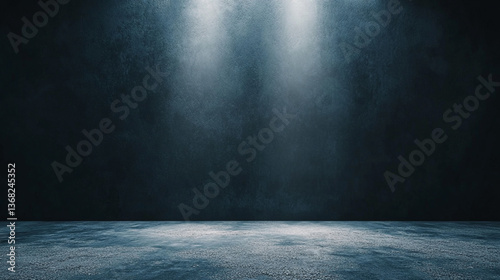 A dark room with a concrete floor and two spotlights shining down from the top of the image wall area