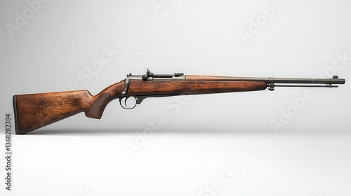 A vintage wooden bolt-action rifle displayed on a neutral background.