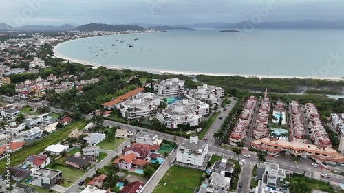 Exploring coastal views of a vibrant beach town in Brazil during a cloudy day