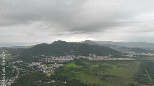 Exploring the lush landscape and dramatic sky of a coastal region in Brazil