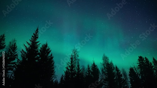 Timelapse of aurora borealis over the forests in early spring in Pirkanmaa, Finland