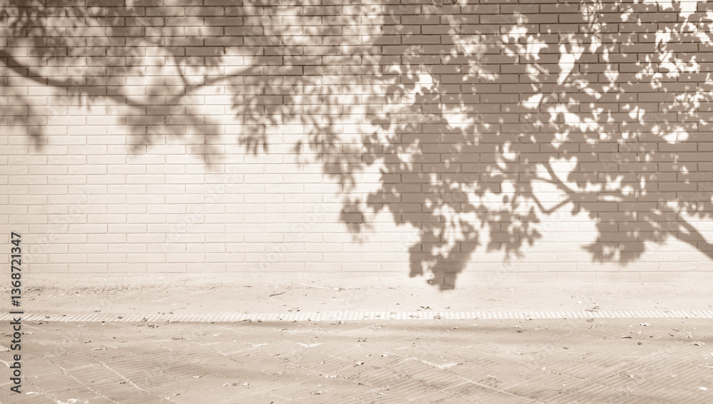 Tree shadow. Light pastel brown beige brick fence wall and sidewalk. Background. Mockup stage template. Space for product design object. Plant leaves branch nature. Exterior street outdoor.
