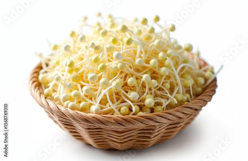 Fresh soybean sprouts presented in wicker basket. Culinary ingredient for vegetarian cuisine. Sprouted bean sprouts with high nutritional value. Healthy food for cooking. Vegetarian meals. Vegan food.