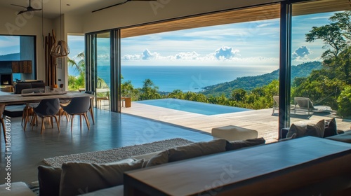Luxury villa with a sleek  open-concept design overlooking the ocean.