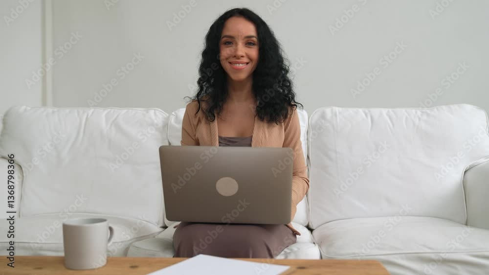 African-American woman using laptop computer for crucial work on internet. Secretary or online content writing working at home. African-American woman using laptop computer for crucial work on internet. Secretary or online content writing working at home.