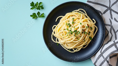 Creamy Pasta Dish with Fresh Parsley on Black Plate