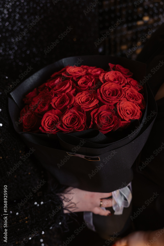 red rose on black background