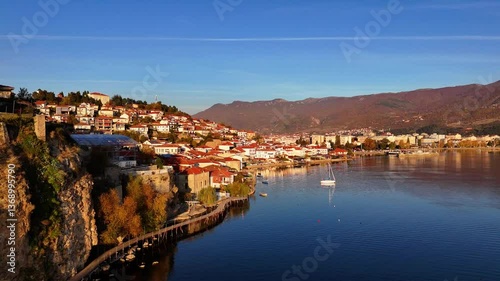 Drone shot of Ohrid boardwalk and Lake Ohrid revealing the old town of Ohrid