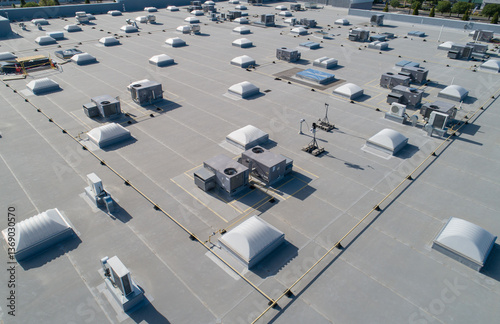 A large building with many vents and a roof