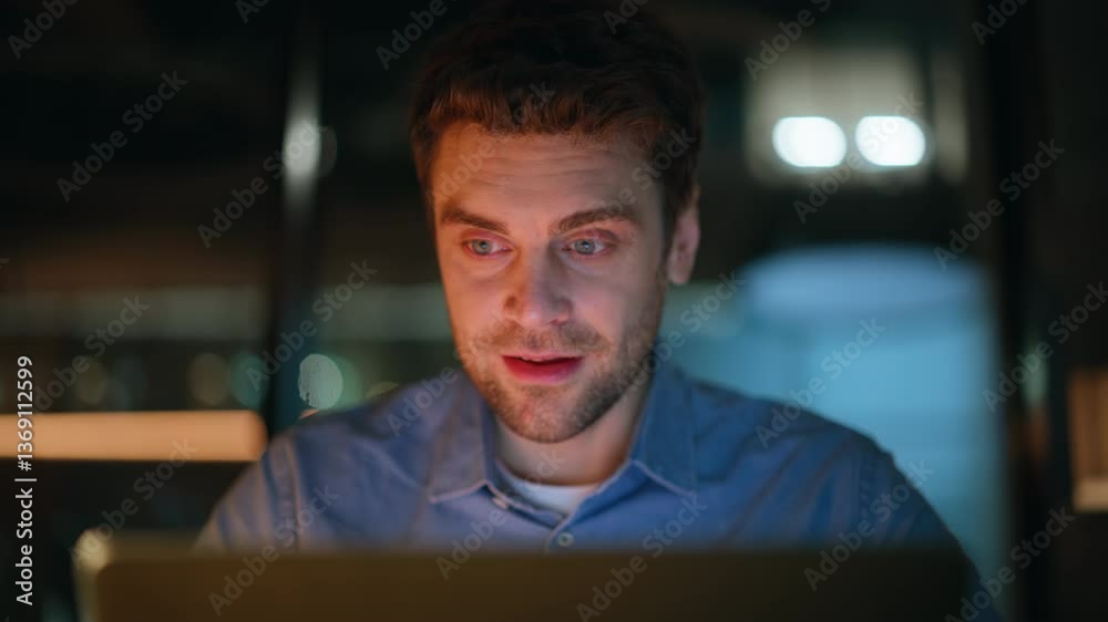 Smiling freelancer browsing computer feeling satisfied project at night closeup. Smiling freelancer browsing computer feeling satisfied project at night closeup.