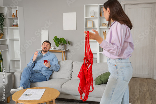 Young man and his wife with...