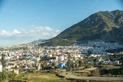 walking through the city Chefchaouen at night photo