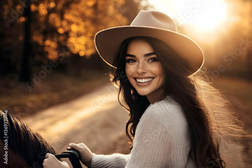Smiling Woman in Hat Rides Horse, Autumnal Background, Warm Sunset Light