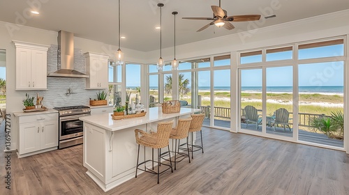 A modern kitchen with ocean views and beautiful natural light