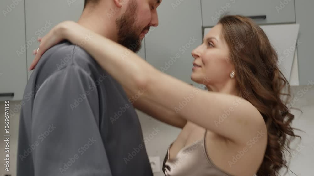 Romantic couple warmly embracing elegant partner, sharing intimate moment of love and connection within modern kitchen setting, symbolizing deep emotional bond Romantic couple warmly embracing elegant partner, sharing intimate moment of love and connection within modern kitchen setting, symbolizing deep emotional bond