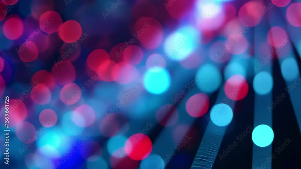 A vibrant array of blue and pink bokeh lights creates a captivating abstract background, ideal for various digital design projects and artistic expressions.