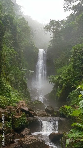 Enchanted Natural Waterfall in Lush Green Tropical Forest Background