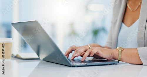 Desk, laptop and hands of woman in office for typing email, administration and planning. Professional, corporate and worker on computer for online schedule, research and project management on website