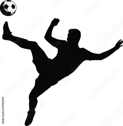 Soccer player kicking the ball, striking a football in a black and white silhouette