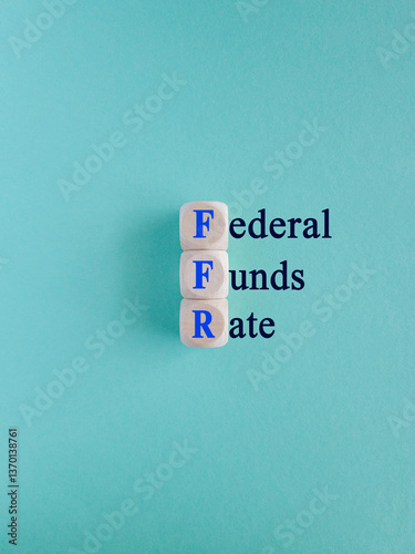 FEDERAL FUNDS RATE symbol. Concept words FEDERAL FUNDS RATE on wooden cubes on a beautiful blue background. Business concept.