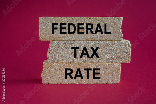Obraz na płótnie Federal tax rates symbol. Brick blocks with words Federal tax rates. Beautiful red background. Business concept. w salonie