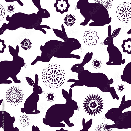 Vector seamless pattern with hand drawn monochome Easter bunnies and flowers on a transparent background. For textile, wallpaper and packaging