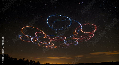 Synchronized drone light painting exhibition against the night starry sky backdrop photo