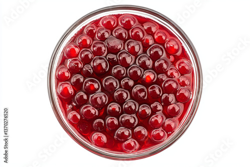 a bowl of cherries with a spoon in it photo