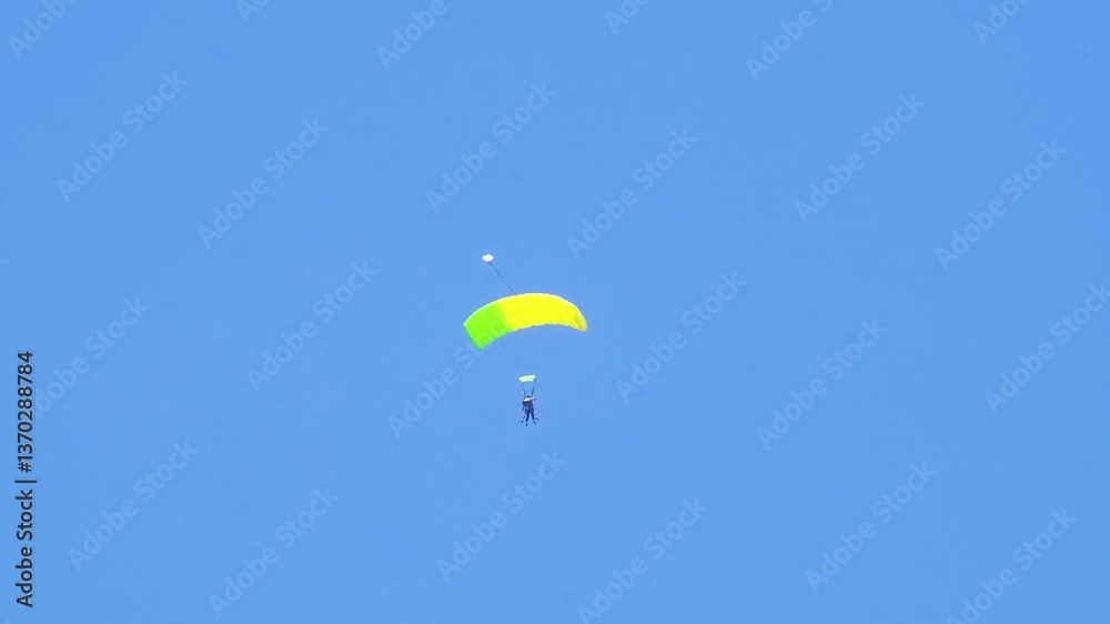 4k Video of High Altitude Paragliding in a Blue Sky by the Seaside 4k Video of High Altitude Paragliding in a Blue Sky by the Seaside