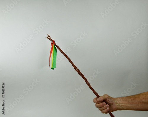 Traditional Czech Easter whip with colored ribbons 
from willow branches in my hand