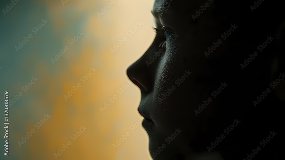 Child's Profile Silhouette, Silhouette of a child's face, thoughtful expression. Child's Profile Silhouette, Silhouette of a child's face, thoughtful expression.