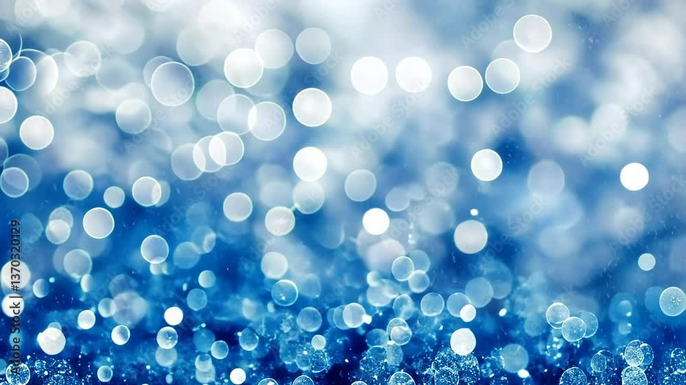 Sparkling blue bokeh background with shimmering light effects creating a serene atmosphere