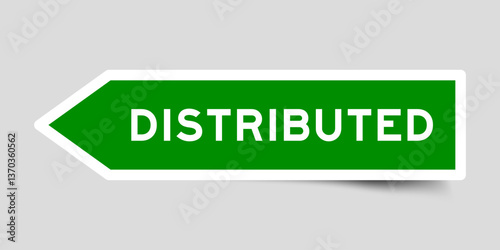 Green color arrow shape sticker label with word distibuted on gray background