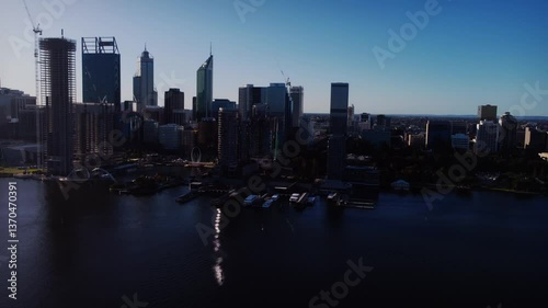 Wallpaper Mural Cinematic aerial drone footage panning from left to right across Perth City, Western Australia, during a stunning sunset.  Torontodigital.ca