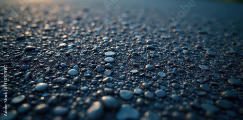 Rough, dark gray asphalt surface with fine aggregate , smooth, design, macro
