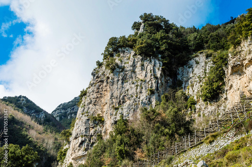 Panoramic view from hiking trail Path of Gods between coastal towns Positano and Praiano. Trekking in Lattari Mountains, Apennines, Amalfi Coast, Campania, Italy, Europe. Coastline Mediterranean Sea.