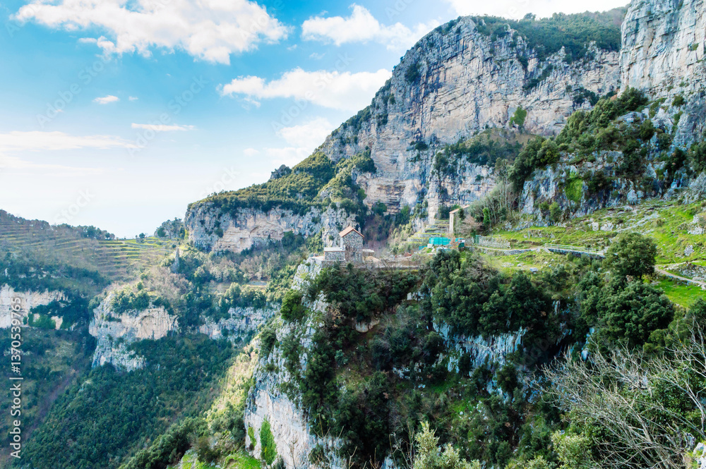 Fototapeta premium Panoramic view from hiking trail Path of Gods between coastal towns Positano and Praiano. Trekking in Lattari Mountains, Apennines, Amalfi Coast, Campania, Italy, Europe. Coastline Mediterranean Sea.