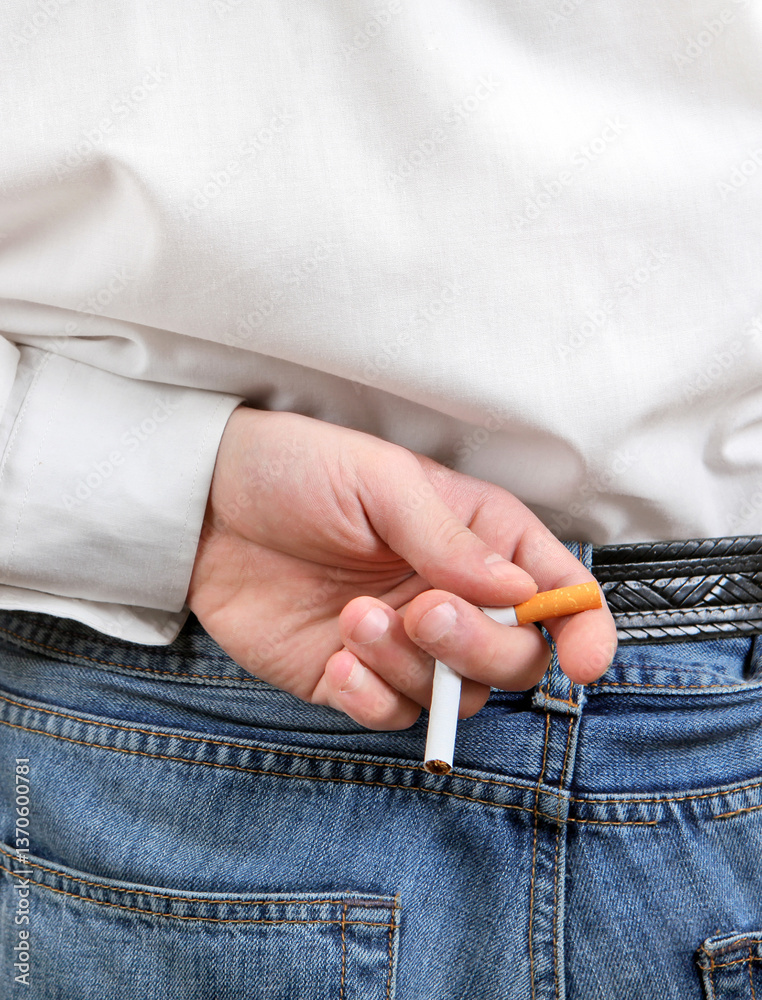 Man hold a Broken Cigarette