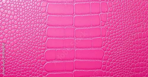 Pink crocodile leather texture background