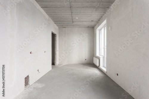 interior of the apartment without decoration in gray colors. rough finish