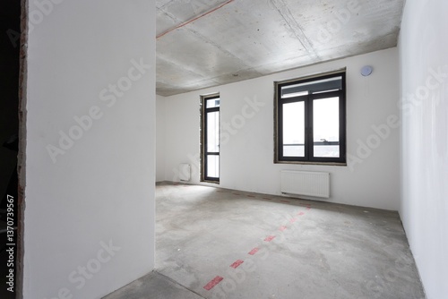 interior of the apartment without decoration in gray colors. rough finish