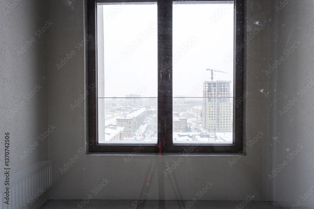 Fototapeta premium interior of the apartment without decoration in gray colors. rough finish