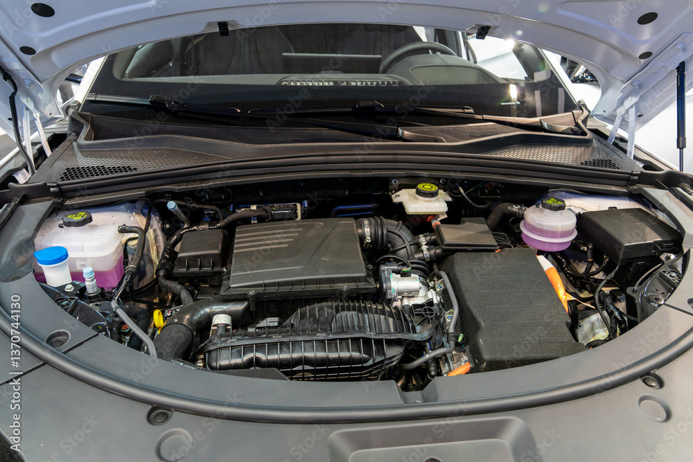 Hybryd car with open hood. Close up of inverter and engine Hybryd car with open hood. Close up of inverter and engine