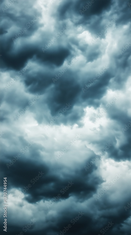 Dramatic Dark Clouds in a Moody Sky Filled with Grey and Overcast Atmosphere Dramatic Dark Clouds in a Moody Sky Filled with Grey and Overcast Atmosphere