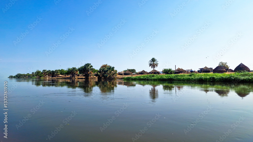 Village along White Nile in South Sudan Village along White Nile in South Sudan