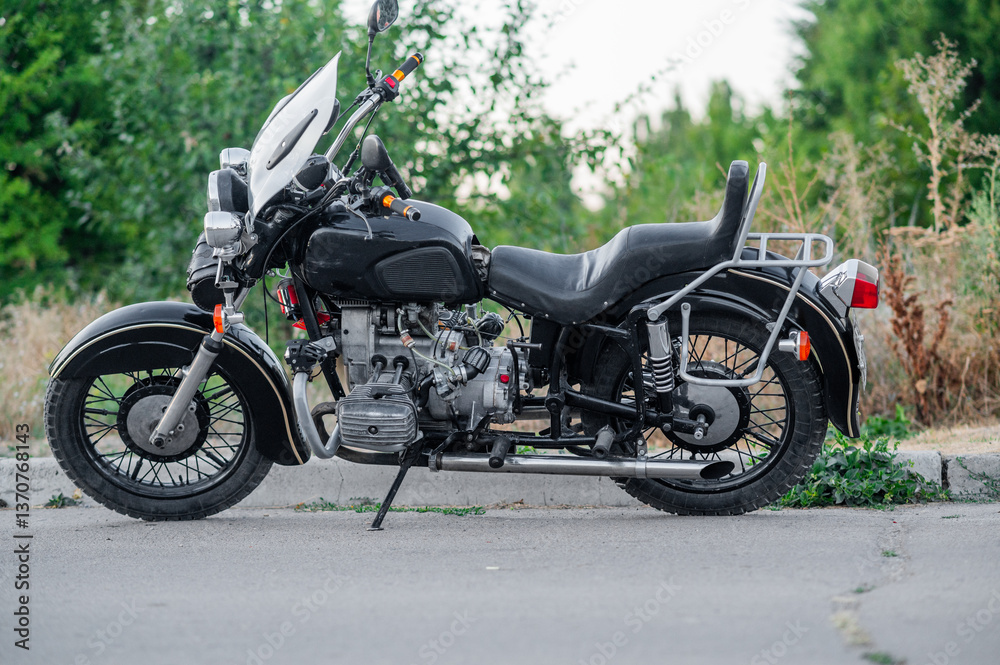 the motorbike is on a stand. the motorbike is on a stand.