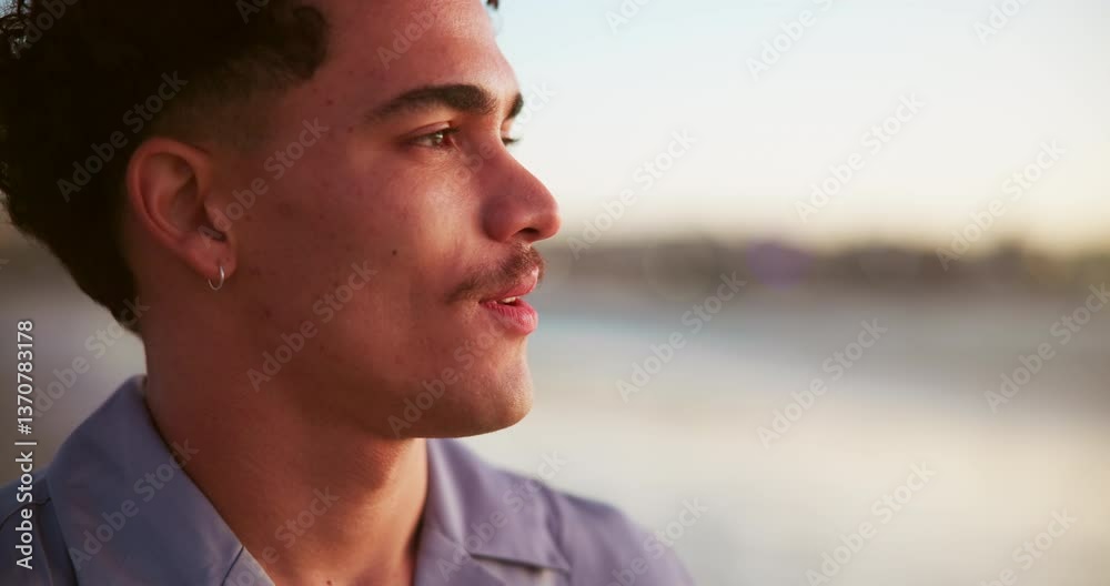 Man, smile and sunset at ocean with thinking, relax and fresh air with travel. Person, happy and face at beach with peace, vacation break and deep breath for mindfulness with space at seaside